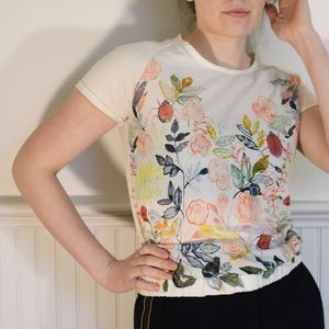 Anthropologie White top with flora/fauna design